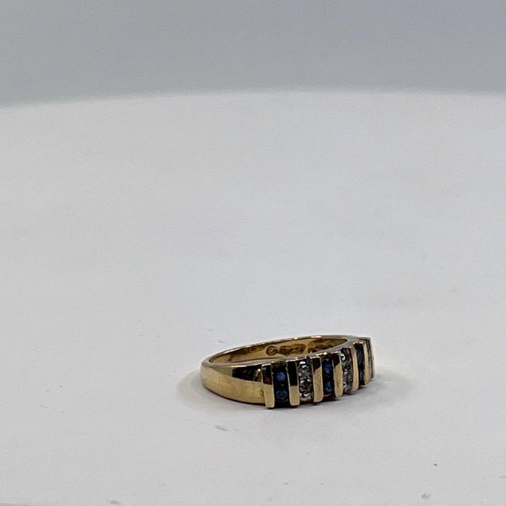 SAPPHIRE AND DIAMOND YELLOW GOLD CHANNEL SET