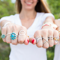 Thumbnail for Rhodium Plated Criss Cross 'X' Ring with Blue CZs