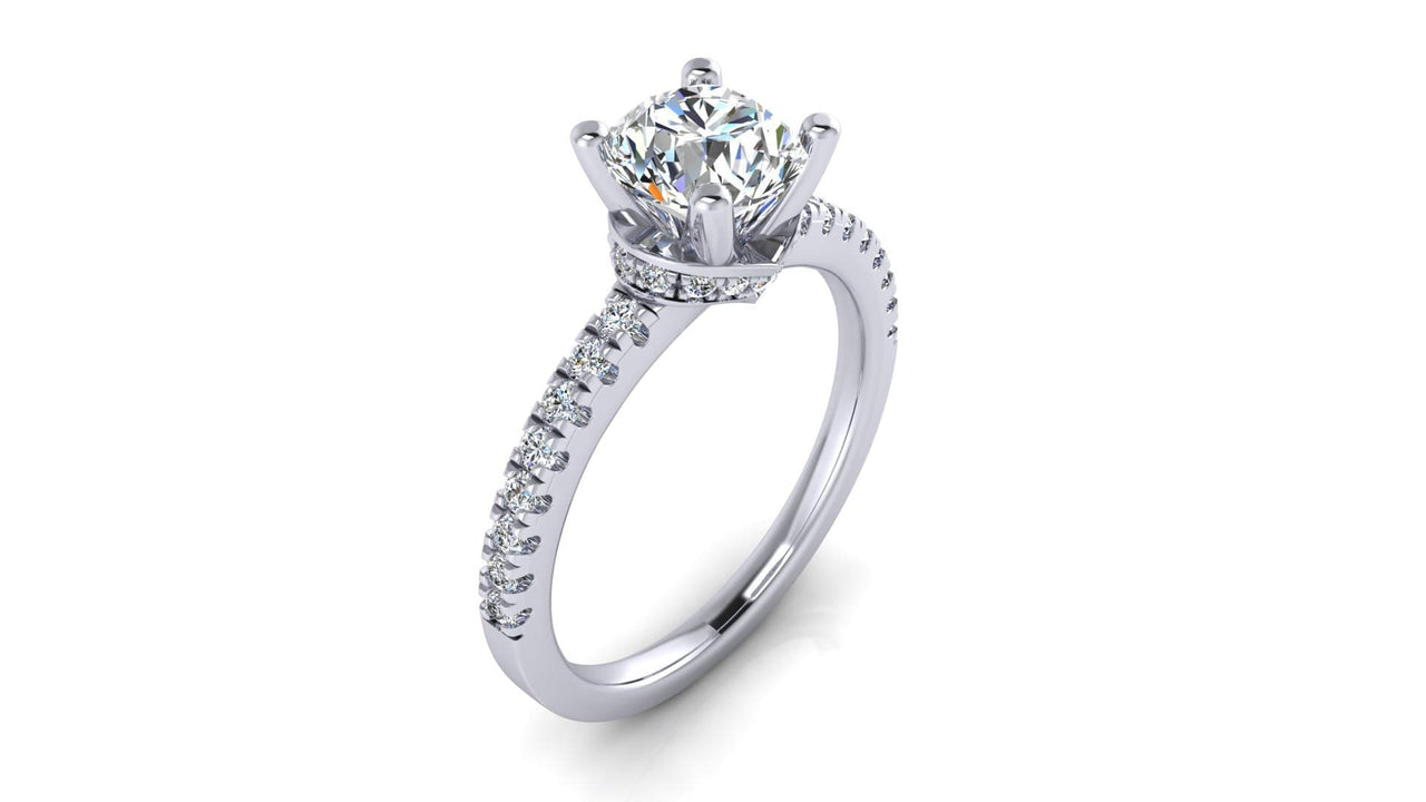 The Prato hidden halo engagement ring, side view showing hidden halo and 18 round side diamonds