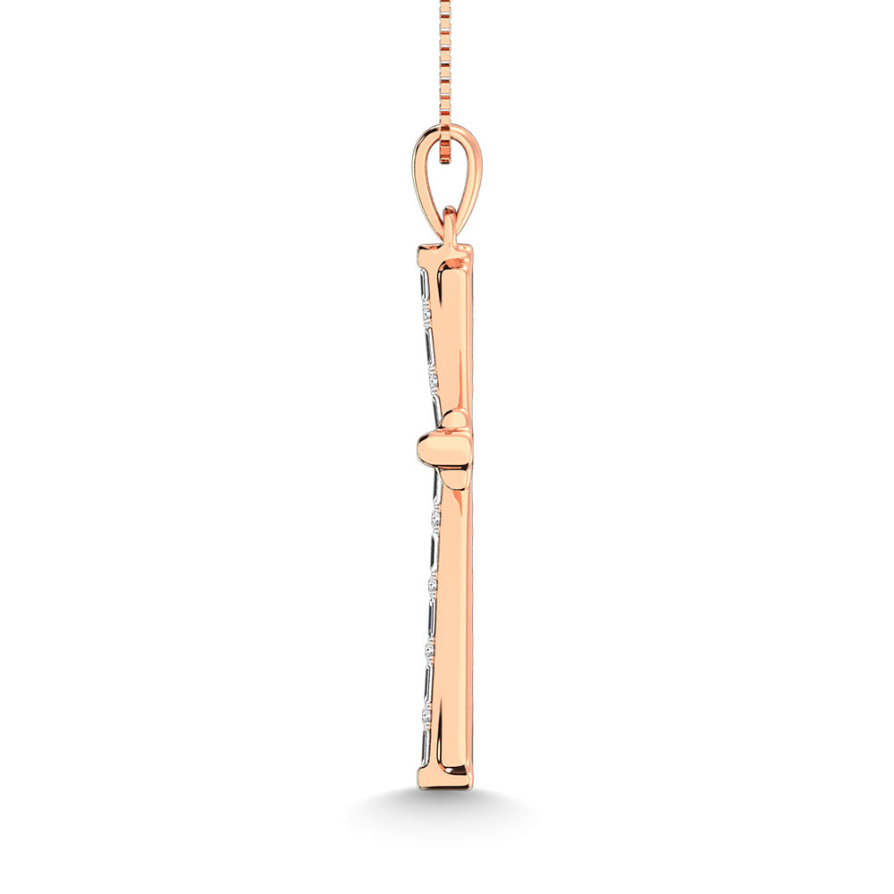 Diamond 1/6 Ct.Tw. Round and Baguette Cut Cross Pendant in 10K White Gold
