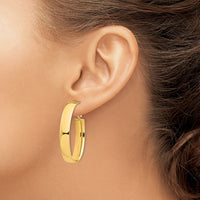 Thumbnail for 14k High Polished 7mm Omega Back Oval Hoop Earrings
