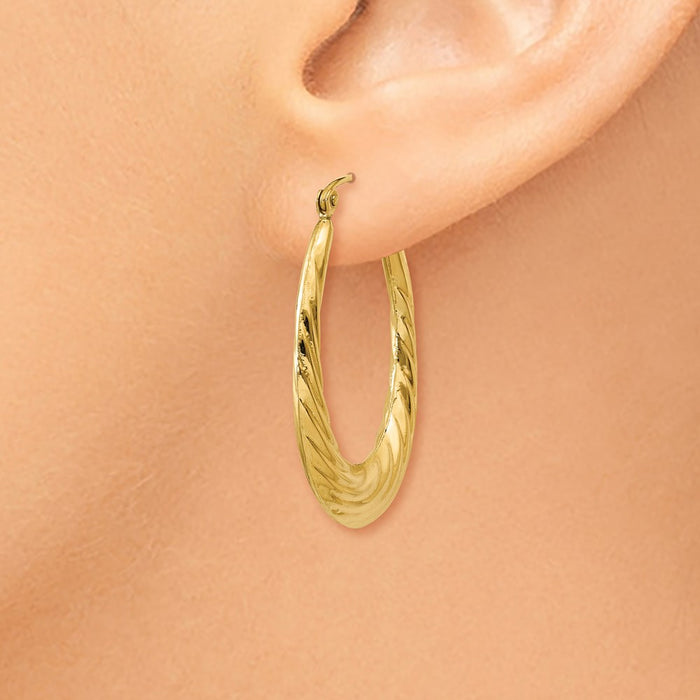 14k Polished Twisted Oval Hollow Hoop Earrings