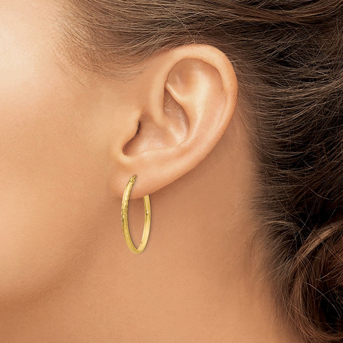 14k Lightweight Diamond-cut Oval Hoop Earrings
